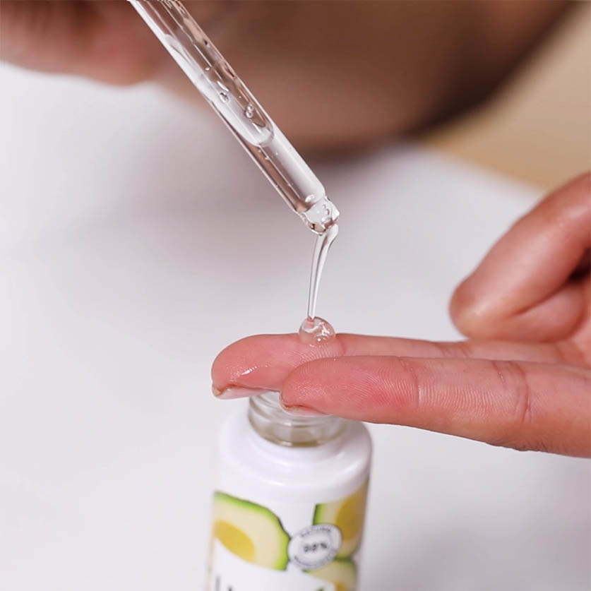 Hyaluronic Acid Serum coming out of dropper